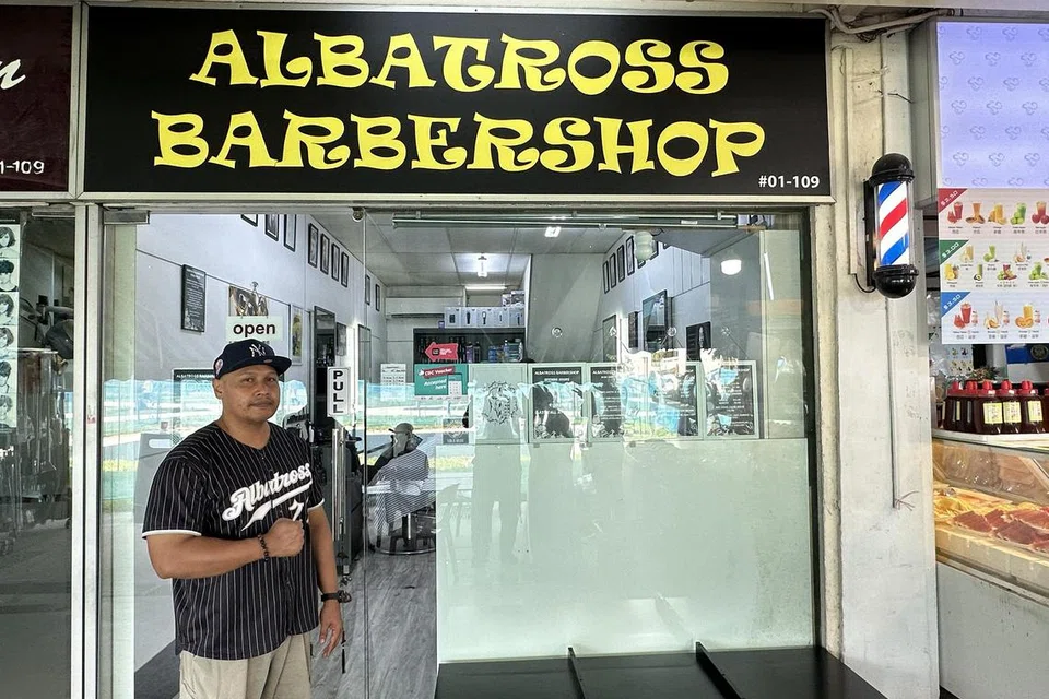 Encik Muhammad Syuhadak Surhan menguruskan kedai Albatross Barbershop di 57 Marine Terrace sejak 2008.