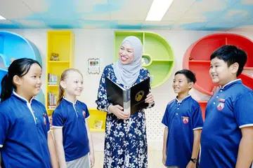 Guru Kanan bagi Keperluan Pembelajaran dan Pelajar Darjah Rendah di Sekolah Rendah Si Ling,  Cik Hafizah Mahmud, antara lapan penerima Anugerah Presiden bagi Guru di Hotel Fairmont pada 3 September.
