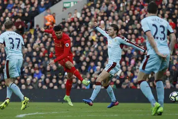Emre Can menyumbatkan gol kedua Liverpool dalam kemenangan 2-1 mereka ke atas Burnley dalam perlawanan EPL di Anfield pada Ahad (12 Mac). 