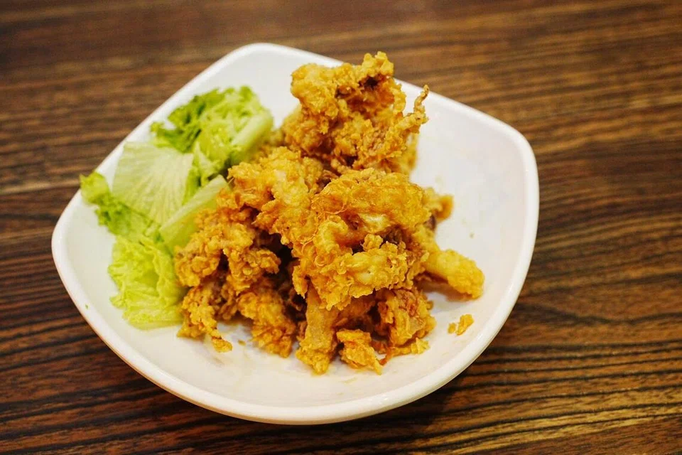 ‘Cumi (sotong) Goreng Tepung’ dijual pada harga $12.50. 