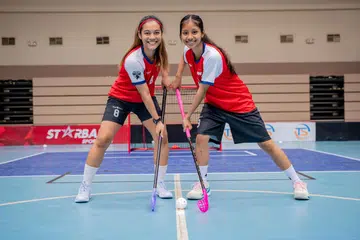 Siti Nurhaliza Khairul Anuar (kiri), yang melepaskan jawatan sebagai jurulatih sepenuh masa, bersama Nur Yuanna Insyirah S Ralli, akan menyertai Program Latihan Luar Negara Bola Lantai Singapura (SFOTP) di Sweden selama tujuh bulan.
