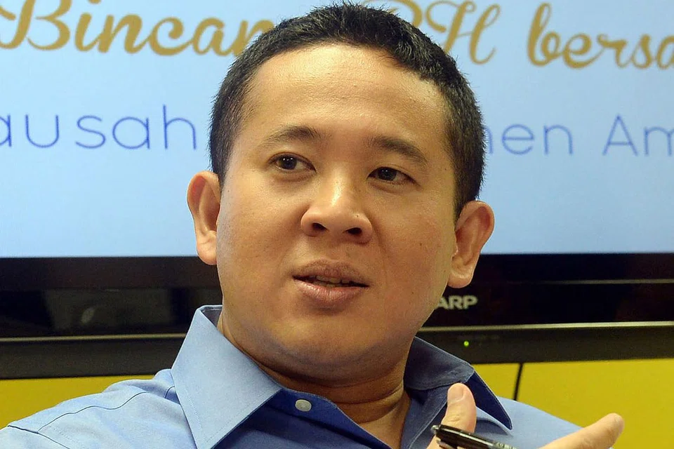 ENCIK AMRIN: Turut memberi maklumat terkini mengenai keadaan penyalahgunaan dadah di Singapura.