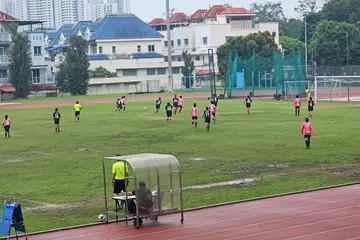 Padang di Stadium Choa Chu Kang bergenang air semasa perlawanan WPL pada 10 Mac.  