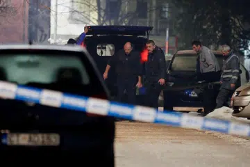 Pekerja membawa mayat selepas seorang lelaki bersenjata melepaskan tembakan dan membunuh beberapa orang di sebuah restoran di Cetinje, Montenegro, pada 1 Januari 2025.