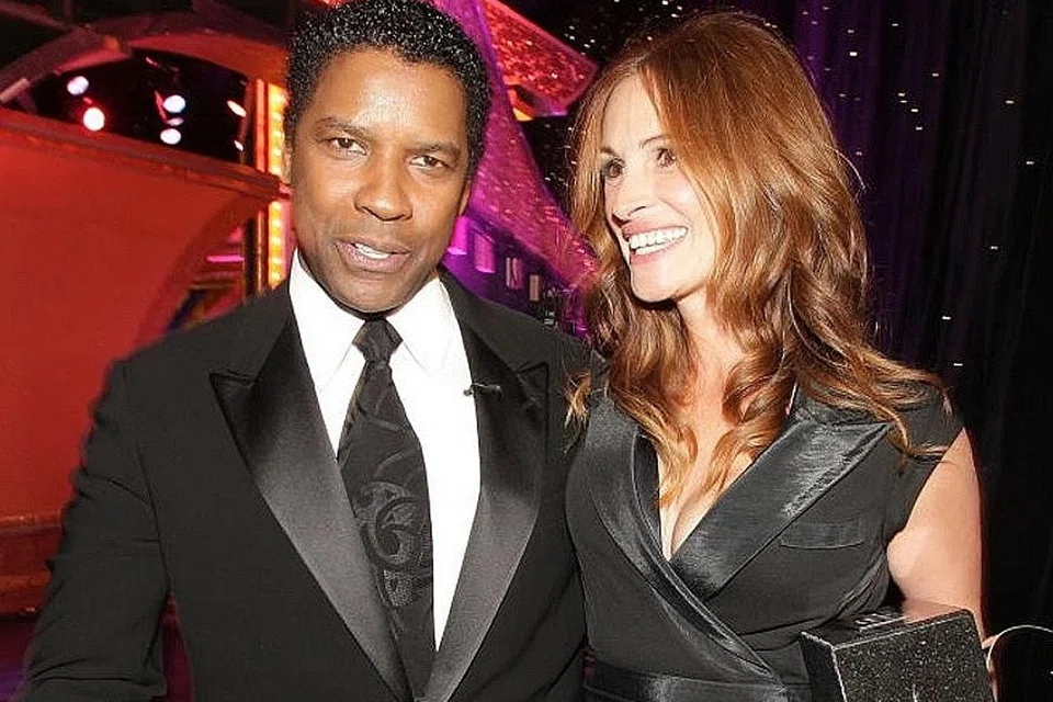 GANDINGAN SERASI: (Gambar atas) Julia Roberts (kanan) dan Denzel Washington kembali menjadi peneraju utama filem Netflix, Leave The World Behind, hampir 30 tahun selepas disatukan dalam filem The Pelican Brief. - Foto NETFLIX