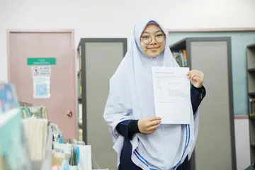 KEPUTUSAN CEMERLANG: Hannah Yusra Rashid antara pelajar Madrasah Aljunied Al-Islamiah yang meraih keputusan cemerlang.