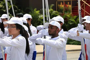 SEMANGAT BERBARIS: Encik Fazil bangga meraih kesempatan menyertai NDP tahun ini. Beliau mewakili sekolahnya, Politeknik Nanyang (NYP), yang turut serta dalam bahagian P&C buat julung-julung kalinya. - Foto ihsan MOHAMED FAZIL MOHAMED ALI