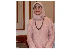 KEKAL BERSATU: Puan Halimah gesa warga Singapura terus kekal bersatu bagi berdepan dengan cabaran akan datang. - Foto fail