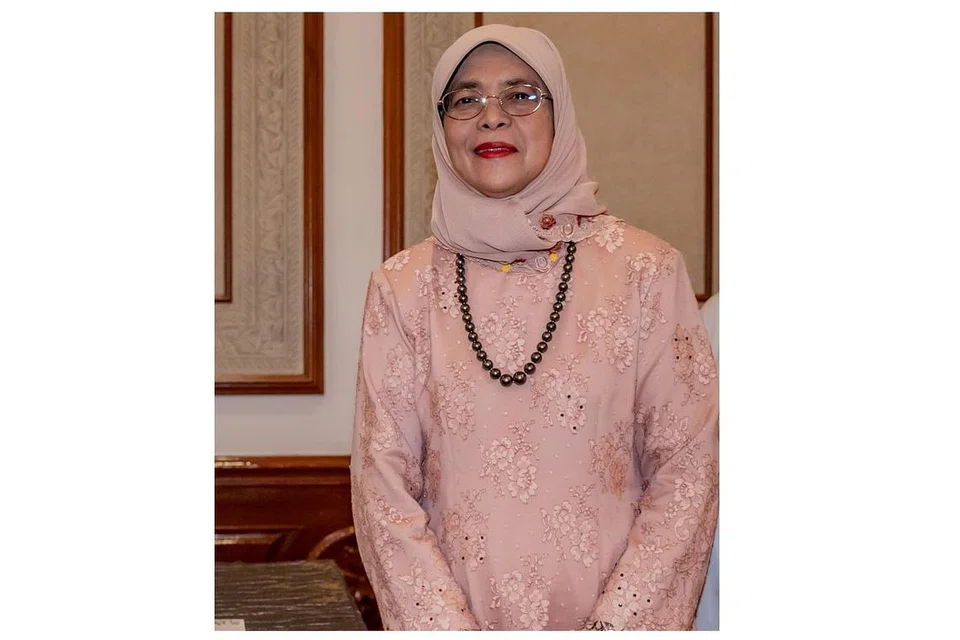 KEKAL BERSATU: Puan Halimah gesa warga Singapura terus kekal bersatu bagi berdepan dengan cabaran akan datang. - Foto fail