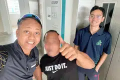 (Dari kiri) Encik Mohammed Nurizham Shah Abdullah; rakan bimbingannya; dan anak Encik Nurizham, Encik Muhammad Musa Mohammed Nurizham Shah, 18 tahun semasa projek Agihan Pra-Ramadan Fitrah pada Mac 2024.