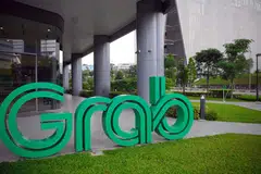 KURANGKAN PEKERJA: Meskipun Grab berada dalam kedudukan utama dalam pasaran tempah pengangkutan dan penghantaran makanan, ia masih belum sampai ke tahap meraih untung.