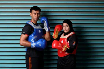 Bekas atlet silat yang kini menceburi sukan wushu, Adib Farhan Ramli dan Siti Khadijah Shahrem. Kedua-duanya antara atlet wushu yang mewakili Singapura dalam Sukan SEA 2025.