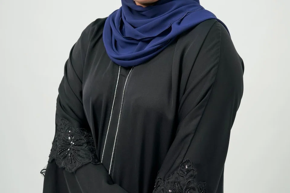 Cik Siti Aishah Wan Nussin, finalis Ibu Teladan Muda ke-31 anjuran Jamiyah Singapura, mengimbangi peranan sebagai pelajar, isteri, dan ibu kepada tiga anak yang masih kecil. 