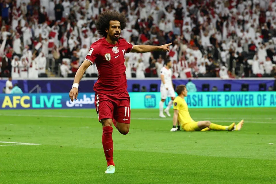 MANTAP: Penyerang Qatar, Akram Afif, meraikan golnya dalam kemenangan 1-0 ke atas Tajikistan dalam aksi Kumpulan A Piala Asia di Stadium Al Bayt pada 17 Januari. 