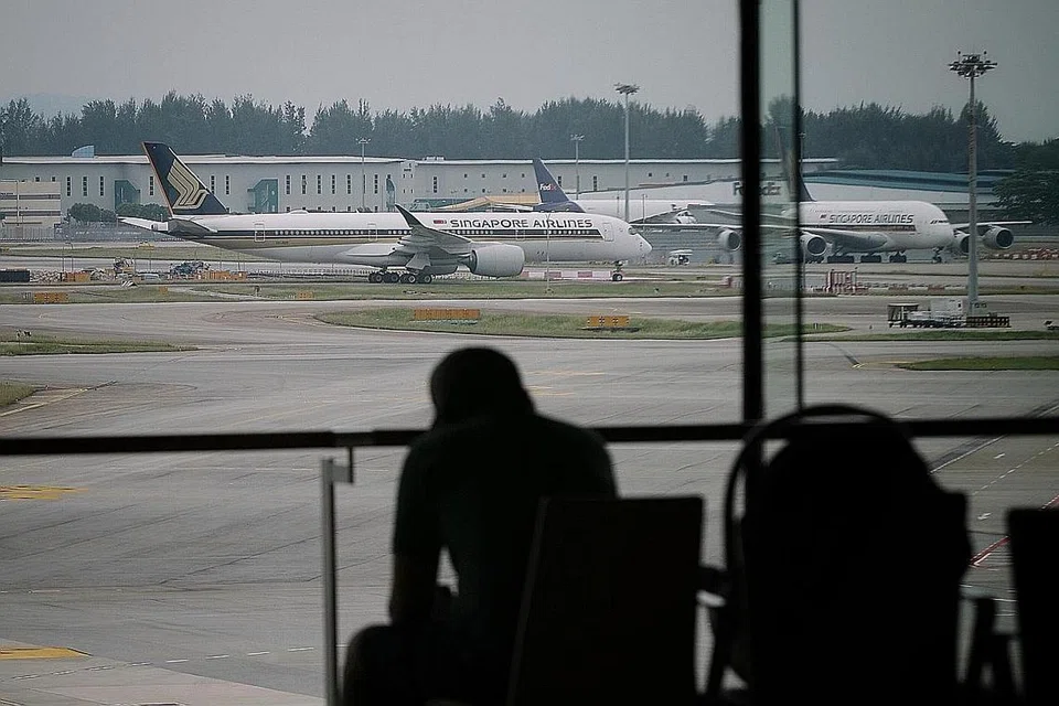 SIAP BANGKIT SEMULA: Dengan status lapangan terbang Changi serta kekuatan tenaga kerja, sektor udara Singapura yakin dapat bangkit lebih gagah dalam beberapa tahun mendatang. - Foto fail
