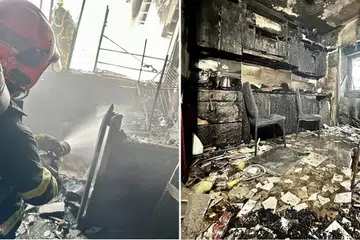 TERBAKAR: Anggota bomba dari Balai Bomba Clementi dan Bukit Batok memadamkan api yang menjilat  dapur sebuah flat tingkat empat di Blok 803 Keat Hong Close pada Jumaat.