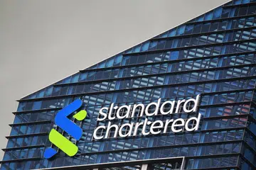 standard chartered, retrench , Singapore 