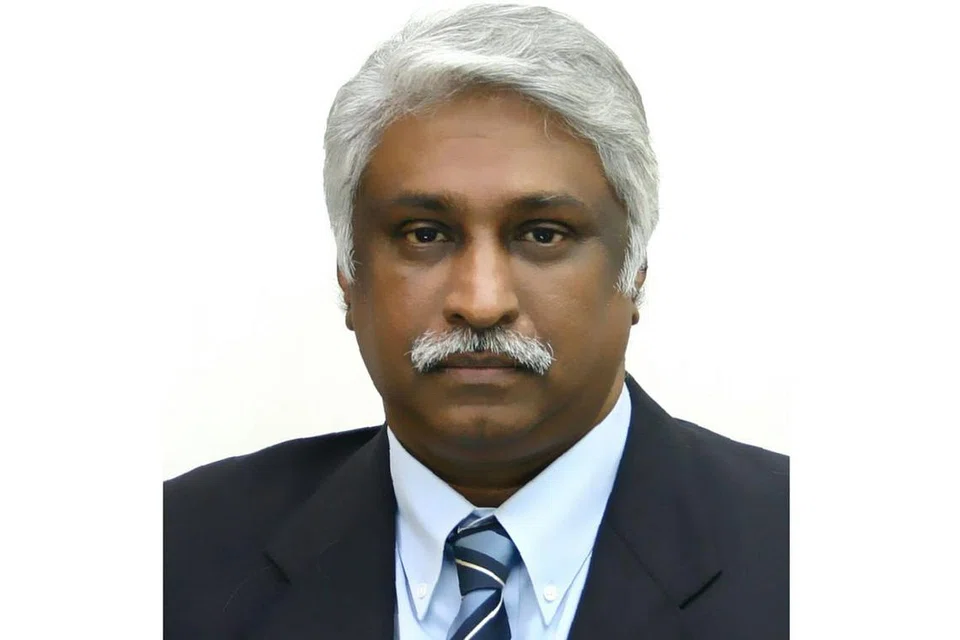 Encik T. Mogan, pemilik Dragnet Smartech Security Pte Ltd. 