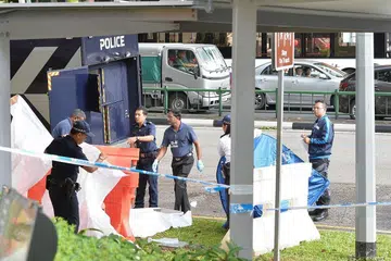 TEMPAT KEJADIAN: Inilah tempat kemalangan di Ang Mo Kio yang meragut nyawa Cik Mariam Atom, apabila beliau terperangkap di bawah bas, dan meninggal dunia di tempat kejadian. - Foto WANBAO