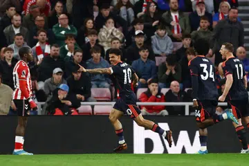 Pemain Nottingham Forest, Morgan Gibbs-White (tengah) meraikan jaringan ketika aksi Liga Perdana England  menentang Sunderland di Stadium.