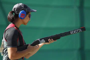 PENGALAMAN BERHARGA: Meskipun gagal meraih pingat, penembak 'Trap' negara, Siti Mastura Rahim, berasa 'skor' beliau tidak mengecewakan. - Foto SPORTSG