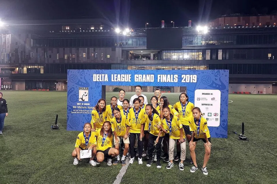 ANTARA PROGRAM SUKAN, SERTAI LIGA DELTA: Peserta 'Youth Rejuvenated' menyertai pertandingan bola sepak Liga Delta pada akhir 2019. Dianjurkan Pasukan Polis Singapura dan Majlis Pencegahan Jenayah Kebangsaan. - Foto BUSSORAH YOUTHS SPORTS CLUB