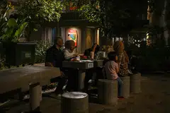 TIDAK DAPAT PINDAH: Sebuah keluarga terpaksa tinggal di chalet selama lebih sebulan kerana rumah baru mereka belum siap.