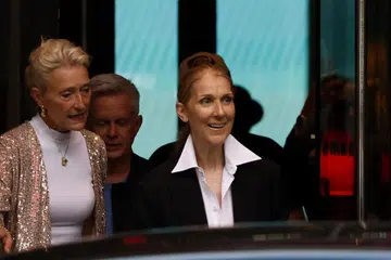 Bintang bersuara emas, Celine Dion (kanan), dilihat tiba di Hotel Royal Monceau berdekatan kawasan Champs-Elysees, tempat penyanyi Amerika, Lady Gaga, yang turut dijadual mewarnai perasmian Sukan Olimpik tinggal.