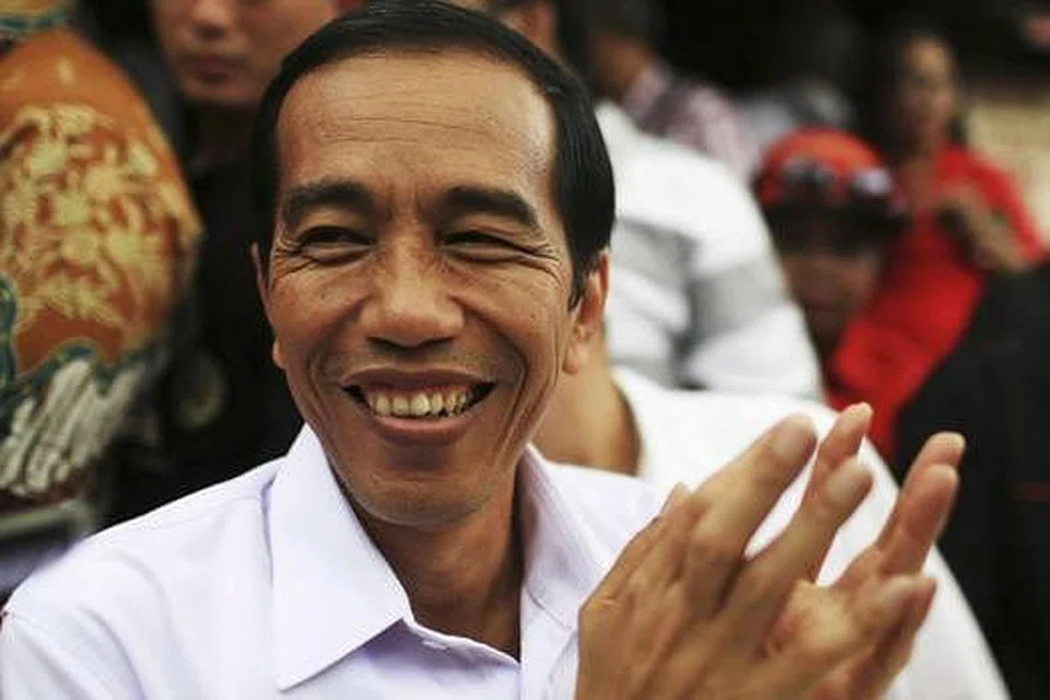 DAPAT RESTU BERTANDING: Pak Jokowi dipilih sebagai calon PDI-P selepas dapat restu Cik Megawati. - Foto REUTERS
