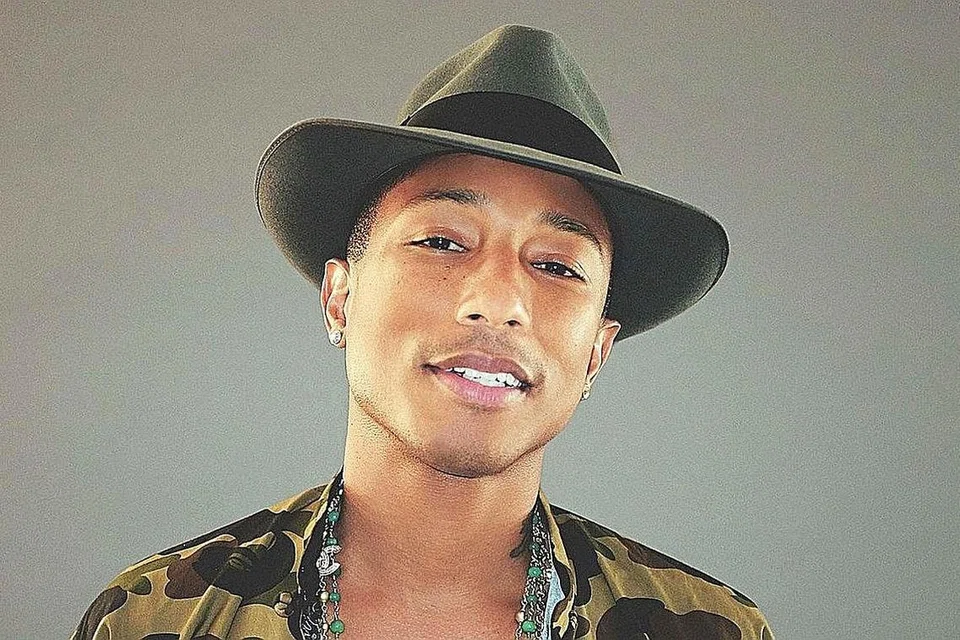 PHARREL WILLIAMS: 'Happy', lagu pengubat duka, diselarikan dengan perasaan gembira watak antagonis Gru dalam filem animasi 'Despicable Me 2' yang jatuh cinta dan berubah menjadi baik. - Foto VEGNEWS