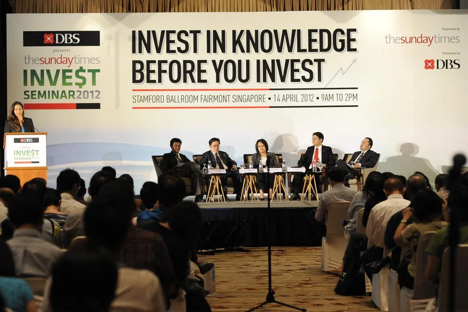 PERLU ILMU MELABUR: Foto fail menunjukkan satu seminar bagi meningkatkan kesedaran orang ramai mengenai strategi pelaburan di Fairmont Singapore.