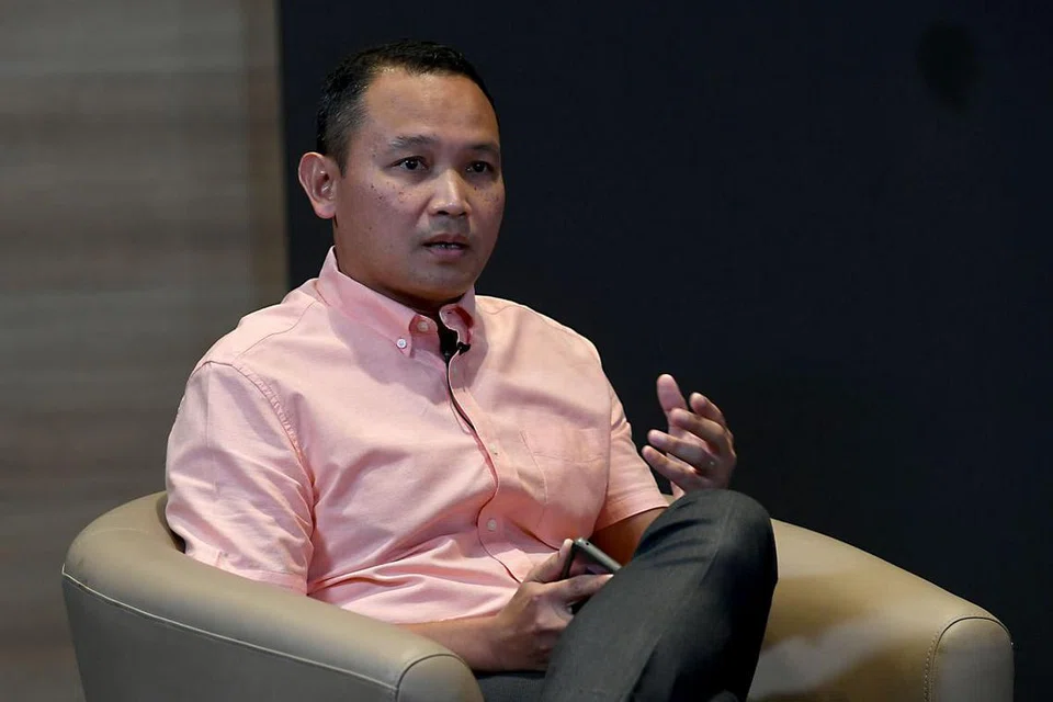  Pengarah, Operasi dan Mobilisasi, Kongres Kesatuan Sekerja Kebangsaan (NTUC), Encik Fahmi Aliman (gambar atas).