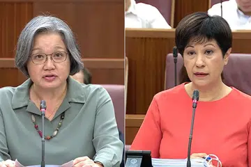 Menteri di Pejabat Perdana Menteri, Cik Indranee Rajah (kanan), menjawab pertanyaan Cik Sylvia Lim (GRC Aljunied).