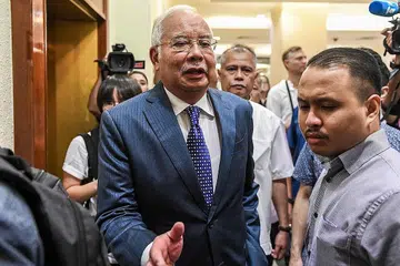 DIPUTUS NOVEMBER: Keputusan sama ada Datuk Najib akan dipanggil untuk membela diri atau dilepaskan daripada tujuh pertuduhan berkaitan penyelewengan dana SRC International akan diketahui pada 11 November ini. - Foto AFP