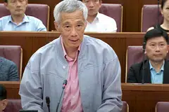 PENUH YAKIN: Perdana Menteri Encik Lee Hsien Loong berkata beliau yakin terhadap kededua menterinya, Encik K. Shanmugam dan Dr Vivian Balakrishnan. 