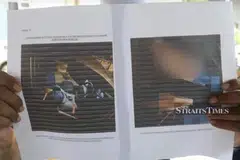 Gambar yang diambil ketika penemuan mayat anak Encik Syazwan Abdullah dalam kereta menunjukkan barang kemasnya masih dipakai.