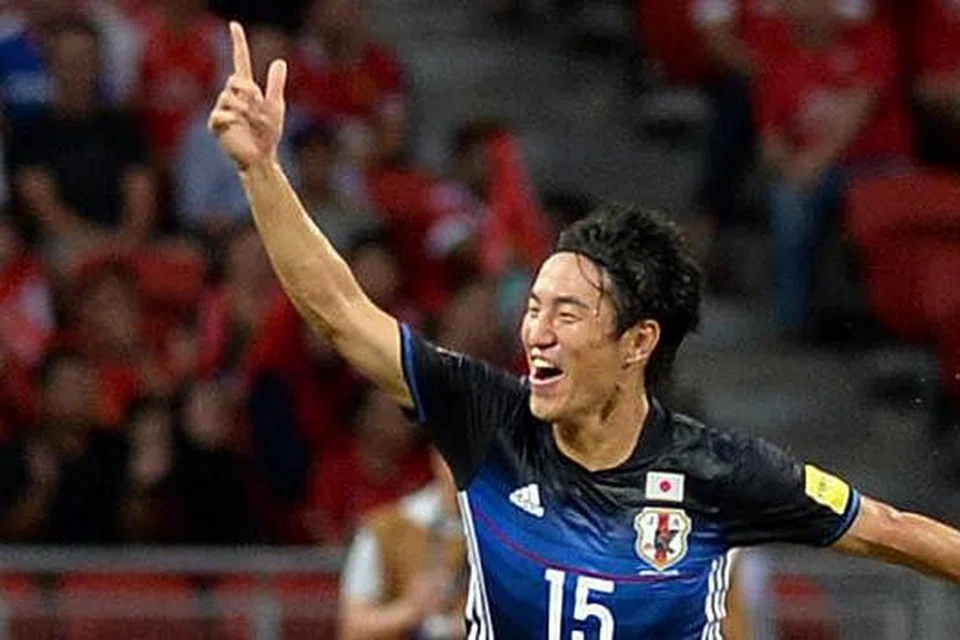 WIRA GOl PEMBUKAAN: Penyerang Jepun, Mu Kanazaki, meraikan gol pembukaan ke atas Singa.