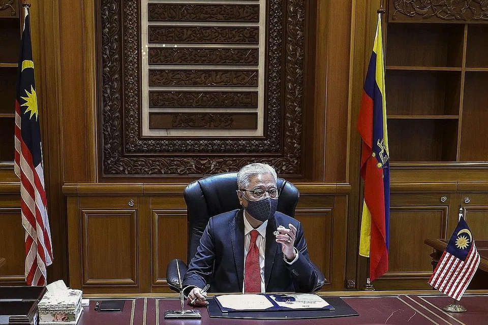 DEMI KESINAMBUNGAN?: Datuk Seri Ismail Sabri mengekalkan dalam Kabinet beliau hampir 80 peratus daripada menteri dalam kerajaan terdahulu, di samping memasukkan beberapa muka baru dan meniadakan beberapa penjawat sebelumnya. - Foto AFP/JABATAN PENERANGAN MALAYSIA