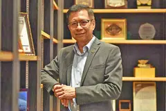 PERANAM BARU: Pengalaman Dr Ahmad Magad dalam politik dan bertugas di syarikat berbilang negara (MNC) berguna bagi pembangunan Persekutuan Perkilangan Singapura (SMF). - Foto BH oleh JOSEPH CHUA