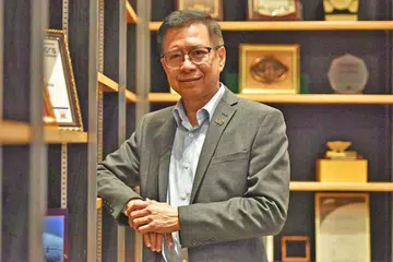 PERANAM BARU: Pengalaman Dr Ahmad Magad dalam politik dan bertugas di syarikat berbilang negara (MNC) berguna bagi pembangunan Persekutuan Perkilangan Singapura (SMF). - Foto BH oleh JOSEPH CHUA