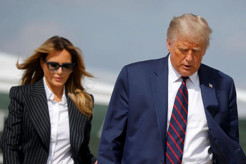 DIJANGKITI COVID-19: Menurut doktor mereka, Encik Trump dan isteri, Cik Melania, kedua-duanya berada dalam keadaan baik pada masa ini. - Foto REUTERS