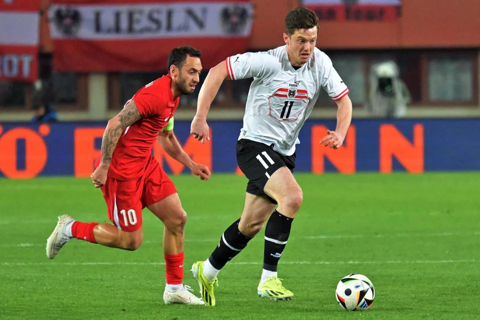 Michael Gregoritsch (kanan), akan diberi tanggungjawab buat pasukan Austria untuk mencari sasaran ke arah gawang lawan dalam Euro 2024. 