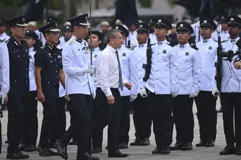 Sambutan Hari Polis pada 3 Jun diserikan dengan kehadiran Menteri Undang-Undang merangkap Menteri Kedua Ehwal Dalam Negeri, Encik Edwin Tong (bertali leher) selaku tetamu terhormat.