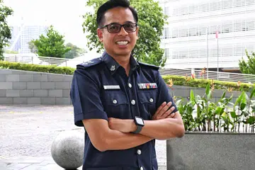 Timbalan Superintenden (DSP) 2 Hamzah Mohamed Hussein adalah antara 981 pegawai Home Team yang menerima pengiktirafan di Majlis Penyampaian Anugerah Hari Kebangsaan Kementerian Ehwal Dalam Negeri (MHA) 2024 pada 13 November.