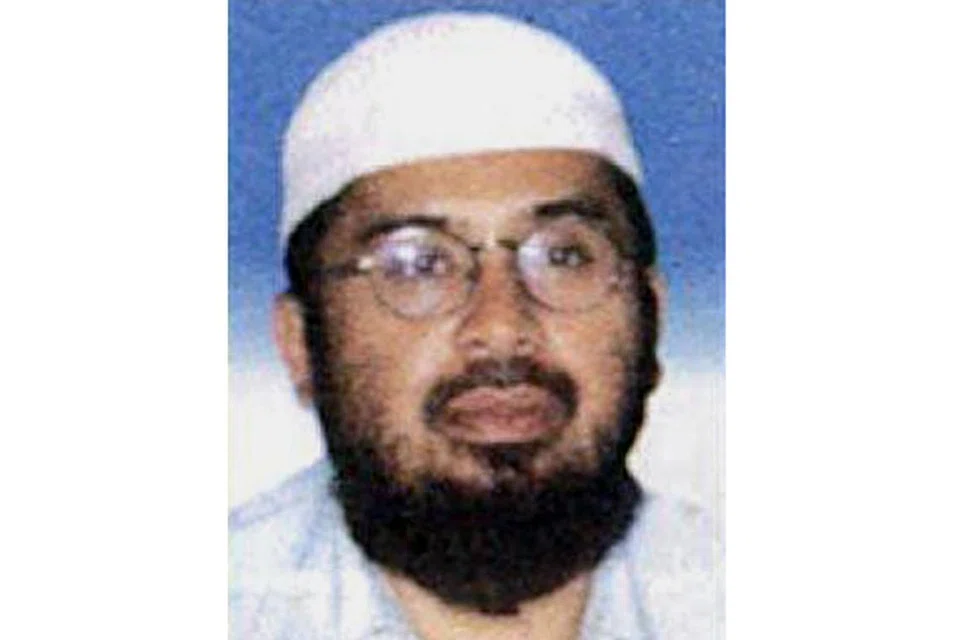 MASIH DIANGGAP ANCAMAN: Riduan Isamuddin, atau lebih dikenali sebagai Hambali, dikatakan telah membantu mendalangi serangan ganas di Bali pada 2002 dan komplot lain. - Foto THE STAR