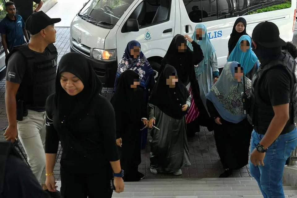 Seorang daripada empat anak pengasas Al-Arqam yang juga isteri kepada Ketua Pegawai Ekselutif (CEO) Global Ikhwan Holdings Sdn Bhd (GISBH), antara 19 yang dibawa ke Mahkamah Majistret Shah Alam untuk mendapatkan perintah reman selama tujuh hari, bermula pada 19 September.