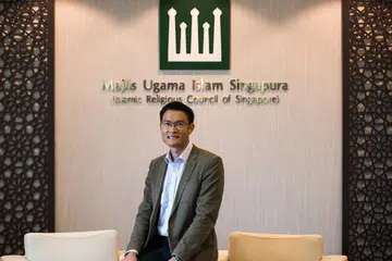 ENCIK ESA MASOOD: Menjadi pegawai pentadbiran (AO), satu skim yang bertujuan memupuk pemimpin dalam perkhidmatan awam, sejak 2009. Beliau dilantik Timbalan Ketua Eksekutif Muis pada Oktober tahun lalu dan kini menyelia pembangunan madrasah sepenuh masa, masjid serta pendidikan Islam di Singapura. - Foto BH oleh LEE JIA WEN