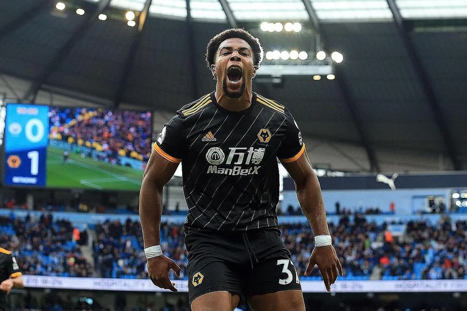 CUKUP BERBISA: Reaksi penyerang Wolves, Adama Traore selepas menjaringkan gol ketika menentang Man City di Stadium Etihad. - Foto AFP