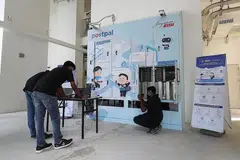 MUDAH AMBIL MEL: PostPal akan membolehkan penduduk menerima pemberitahuan mengenai penghantaran mel melalui aplikasi mudah alih. - Foto ZAOBAO