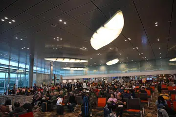 Penumpang pesawat SQ404 menunggu di Terminal 3 Lapangan Terbang Changi pada 13 Januari 2025. Lapangan Terbang Changi dijangka dirangsang kebangkitan ekonomi di Asia-Pasifik dan rangkaian ketersambungan yang lebih baik.